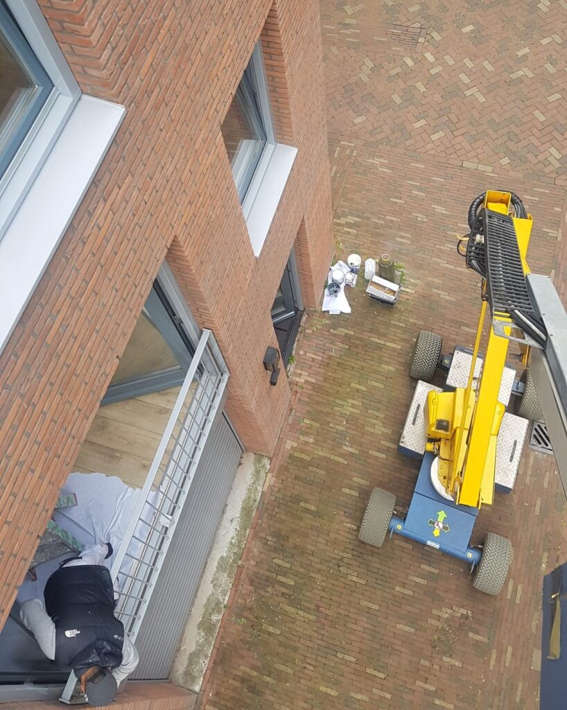 Gevelrenovatie technieken met een hoogwerker